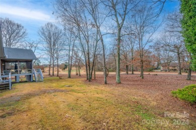 Beautifully Updated Home Located on Woodbridge Golf Course in on Woodbridge Golf Links in North Carolina - for sale on GolfHomes.com, golf home, golf lot