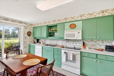 Enjoy effortless living with stunning golf course setting in on Saint Clair Country Club in Illinois - for sale on GolfHomes.com, golf home, golf lot