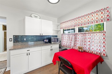 Welcome to this beautifully updated single-family pool home in on The Dunedin Country Club in Florida - for sale on GolfHomes.com, golf home, golf lot