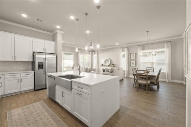Welcome to a home that blends designer style with everyday on Wildhorse Golf Club of Robson Ranch in Texas - for sale on GolfHomes.com, golf home, golf lot