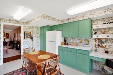 Enjoy effortless living with stunning golf course setting in on Saint Clair Country Club in Illinois - for sale on GolfHomes.com, golf home, golf lot