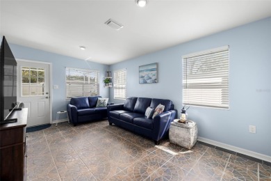 Welcome to this beautifully updated single-family pool home in on The Dunedin Country Club in Florida - for sale on GolfHomes.com, golf home, golf lot