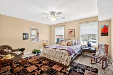Enjoy effortless living with stunning golf course setting in on Saint Clair Country Club in Illinois - for sale on GolfHomes.com, golf home, golf lot