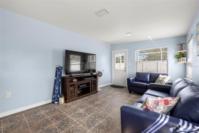 Welcome to this beautifully updated single-family pool home in on The Dunedin Country Club in Florida - for sale on GolfHomes.com, golf home, golf lot