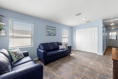 Welcome to this beautifully updated single-family pool home in on The Dunedin Country Club in Florida - for sale on GolfHomes.com, golf home, golf lot