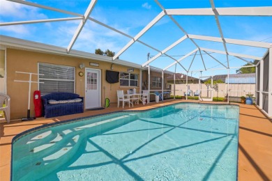 Welcome to this beautifully updated single-family pool home in on The Dunedin Country Club in Florida - for sale on GolfHomes.com, golf home, golf lot