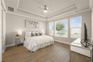Welcome to a home that blends designer style with everyday on Wildhorse Golf Club of Robson Ranch in Texas - for sale on GolfHomes.com, golf home, golf lot
