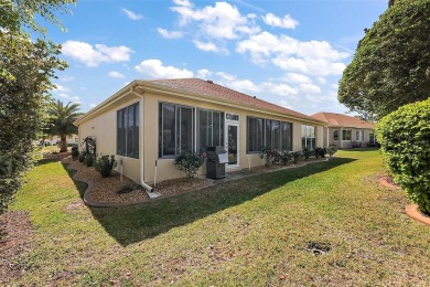 PRICE TO SELL!  Hanover Model - Block & Stucco - 3 Bedrooms - 2 on Eagle Ridge At Spruce Creek Country Club in Florida - for sale on GolfHomes.com, golf home, golf lot