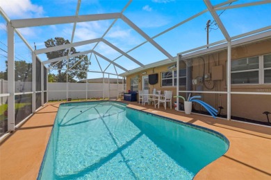 Welcome to this beautifully updated single-family pool home in on The Dunedin Country Club in Florida - for sale on GolfHomes.com, golf home, golf lot