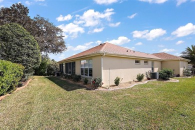 PRICE TO SELL!  Hanover Model - Block & Stucco - 3 Bedrooms - 2 on Eagle Ridge At Spruce Creek Country Club in Florida - for sale on GolfHomes.com, golf home, golf lot