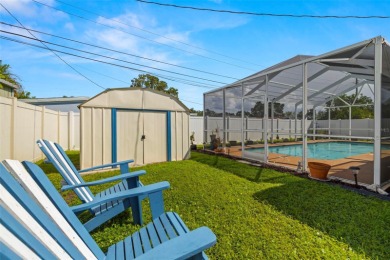 Welcome to this beautifully updated single-family pool home in on The Dunedin Country Club in Florida - for sale on GolfHomes.com, golf home, golf lot