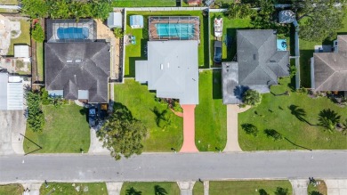 Welcome to this beautifully updated single-family pool home in on The Dunedin Country Club in Florida - for sale on GolfHomes.com, golf home, golf lot