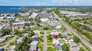 Welcome to this beautifully updated single-family pool home in on The Dunedin Country Club in Florida - for sale on GolfHomes.com, golf home, golf lot