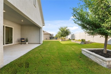 Welcome to a home that blends designer style with everyday on Wildhorse Golf Club of Robson Ranch in Texas - for sale on GolfHomes.com, golf home, golf lot
