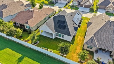Welcome to a home that blends designer style with everyday on Wildhorse Golf Club of Robson Ranch in Texas - for sale on GolfHomes.com, golf home, golf lot