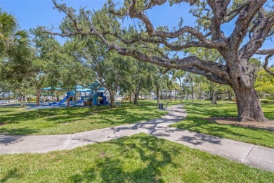 Welcome to this beautifully updated single-family pool home in on The Dunedin Country Club in Florida - for sale on GolfHomes.com, golf home, golf lot