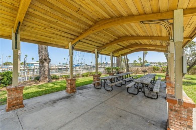 Welcome to this beautifully updated single-family pool home in on The Dunedin Country Club in Florida - for sale on GolfHomes.com, golf home, golf lot