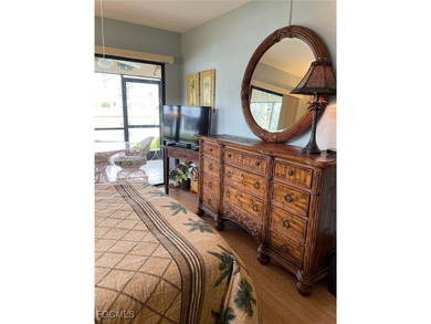 Quick move-in! Home is 2/2, lake view, steps from pool, first on Hideaway Country Club in Florida - for sale on GolfHomes.com, golf home, golf lot