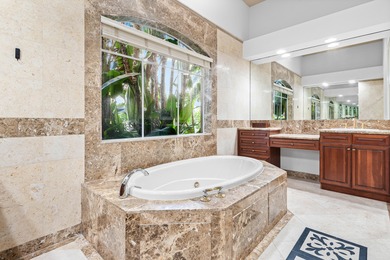 This former model home in Mizner Country Club has IMMEDIATE GOLF on Mizner Country Club in Florida - for sale on GolfHomes.com, golf home, golf lot