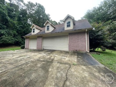 Welcome to 100 Goldfinch Circle--an all-brick ranch-style home on Turtle Cove Golf Course in Georgia - for sale on GolfHomes.com, golf home, golf lot