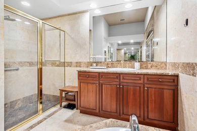 This former model home in Mizner Country Club has IMMEDIATE GOLF on Mizner Country Club in Florida - for sale on GolfHomes.com, golf home, golf lot