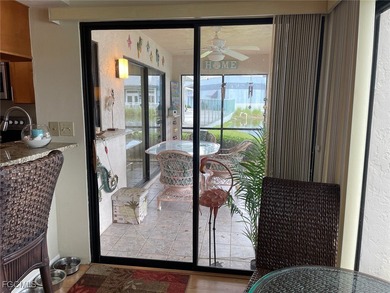 Quick move-in! Home is 2/2, lake view, steps from pool, first on Hideaway Country Club in Florida - for sale on GolfHomes.com, golf home, golf lot