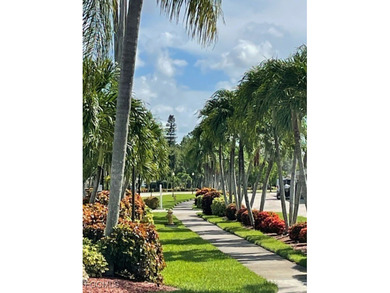 Quick move-in! Home is 2/2, lake view, steps from pool, first on Hideaway Country Club in Florida - for sale on GolfHomes.com, golf home, golf lot