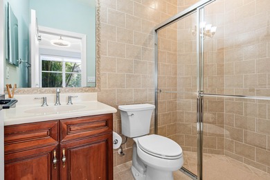 This former model home in Mizner Country Club has IMMEDIATE GOLF on Mizner Country Club in Florida - for sale on GolfHomes.com, golf home, golf lot