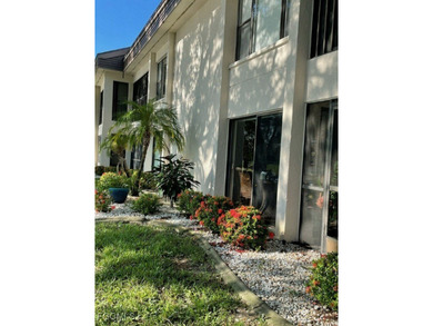 Quick move-in! Home is 2/2, lake view, steps from pool, first on Hideaway Country Club in Florida - for sale on GolfHomes.com, golf home, golf lot