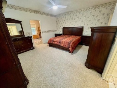 Welcome to 100 Goldfinch Circle--an all-brick ranch-style home on Turtle Cove Golf Course in Georgia - for sale on GolfHomes.com, golf home, golf lot