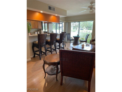 Quick move-in! Home is 2/2, lake view, steps from pool, first on Hideaway Country Club in Florida - for sale on GolfHomes.com, golf home, golf lot