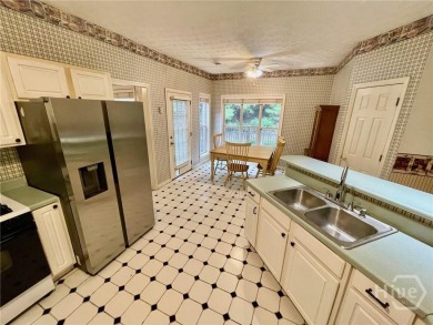 Welcome to 100 Goldfinch Circle--an all-brick ranch-style home on Turtle Cove Golf Course in Georgia - for sale on GolfHomes.com, golf home, golf lot