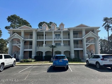 Spacious, fully furnished 2BR/2BA second-floor center-unit condo on Brunswick Plantation and Golf Resorts in North Carolina - for sale on GolfHomes.com, golf home, golf lot