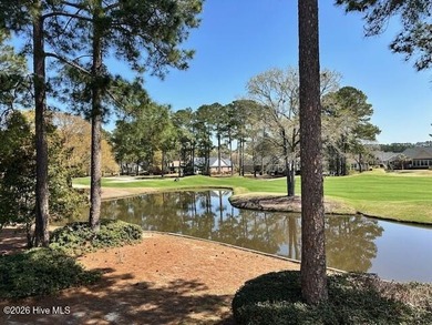 Spacious, fully furnished 2BR/2BA second-floor center-unit condo on Brunswick Plantation and Golf Resorts in North Carolina - for sale on GolfHomes.com, golf home, golf lot