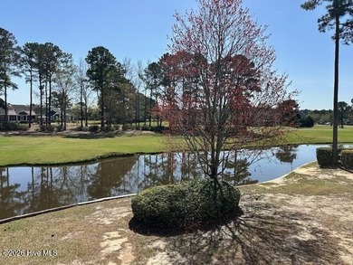 Spacious, fully furnished 2BR/2BA second-floor center-unit condo on Brunswick Plantation and Golf Resorts in North Carolina - for sale on GolfHomes.com, golf home, golf lot