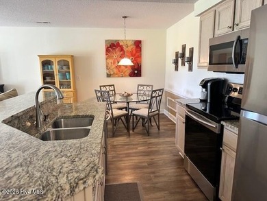 Spacious, fully furnished 2BR/2BA second-floor center-unit condo on Brunswick Plantation and Golf Resorts in North Carolina - for sale on GolfHomes.com, golf home, golf lot