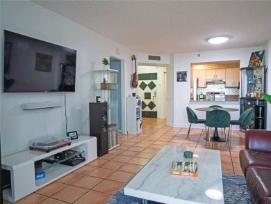 Welcome to Crystal Bay, where a bright and updated condo waits on Feather Sound Country Club in Florida - for sale on GolfHomes.com, golf home, golf lot