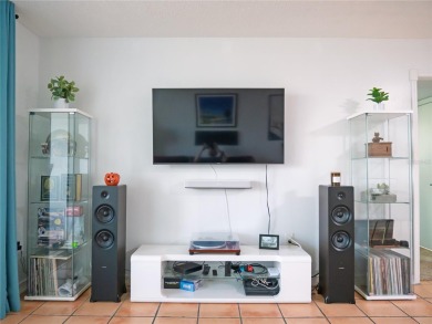 Welcome to Crystal Bay, where a bright and updated condo waits on Feather Sound Country Club in Florida - for sale on GolfHomes.com, golf home, golf lot