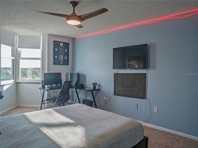Welcome to Crystal Bay, where a bright and updated condo waits on Feather Sound Country Club in Florida - for sale on GolfHomes.com, golf home, golf lot