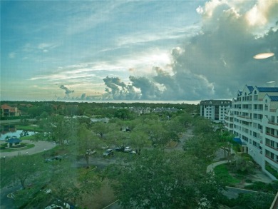Welcome to Crystal Bay, where a bright and updated condo waits on Feather Sound Country Club in Florida - for sale on GolfHomes.com, golf home, golf lot