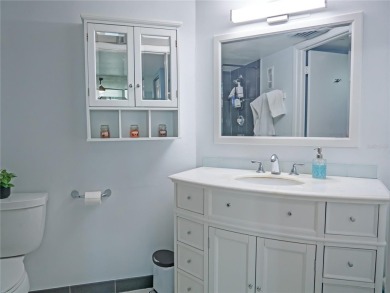Welcome to Crystal Bay, where a bright and updated condo waits on Feather Sound Country Club in Florida - for sale on GolfHomes.com, golf home, golf lot