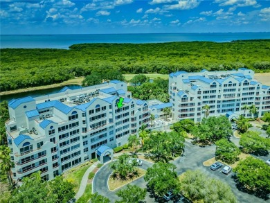 Welcome to Crystal Bay, where a bright and updated condo waits on Feather Sound Country Club in Florida - for sale on GolfHomes.com, golf home, golf lot