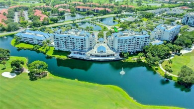 Welcome to Crystal Bay, where a bright and updated condo waits on Feather Sound Country Club in Florida - for sale on GolfHomes.com, golf home, golf lot