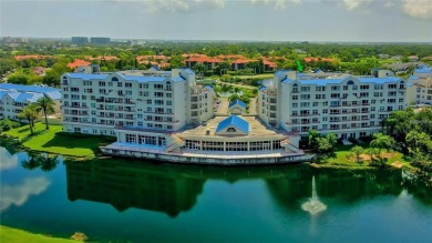 Welcome to Crystal Bay, where a bright and updated condo waits on Feather Sound Country Club in Florida - for sale on GolfHomes.com, golf home, golf lot