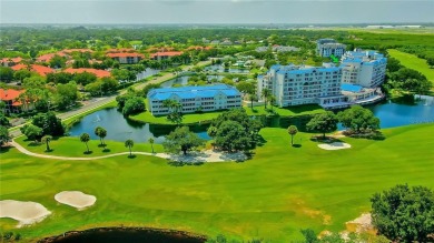 Welcome to Crystal Bay, where a bright and updated condo waits on Feather Sound Country Club in Florida - for sale on GolfHomes.com, golf home, golf lot