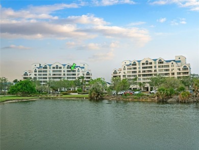 Welcome to Crystal Bay, where a bright and updated condo waits on Feather Sound Country Club in Florida - for sale on GolfHomes.com, golf home, golf lot