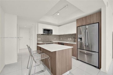 Exclusive residence in the heart of Downtown Doral. Corner unit on Doral Golf Resort in Florida - for sale on GolfHomes.com, golf home, golf lot