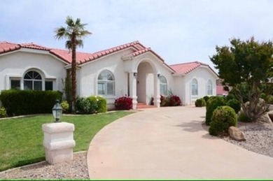 Come home to serene panoramic views of the red rock landscape on St. George Golf Course in Utah - for sale on GolfHomes.com, golf home, golf lot