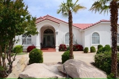 Come home to serene panoramic views of the red rock landscape on St. George Golf Course in Utah - for sale on GolfHomes.com, golf home, golf lot
