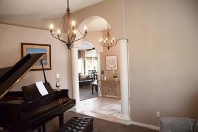 Come home to serene panoramic views of the red rock landscape on St. George Golf Course in Utah - for sale on GolfHomes.com, golf home, golf lot